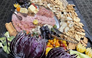 city centre events table with catered options like meat and crackers