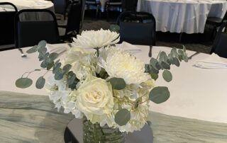 city centre events table with flowers and glass